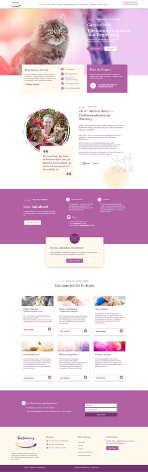 Die Startseite von tierstimmung,de. Die Hauptfarbe ist Weiss mit Violett. Oben ist der Kopf einer langhaarigen, getigerten Katze zu sehen.